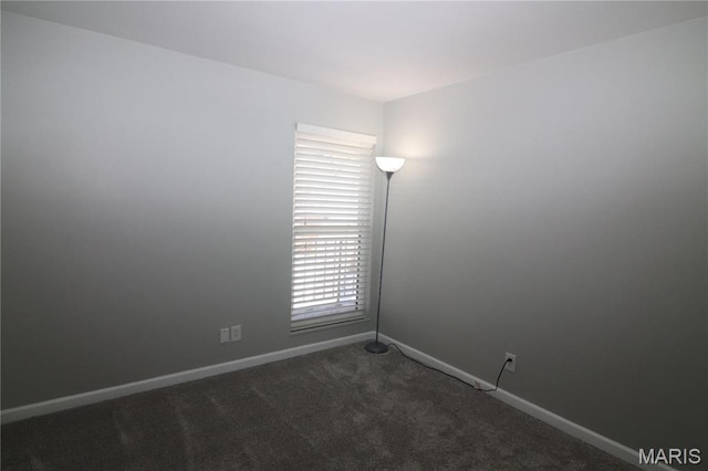 1090 Mersey Bend Dr Unit F, Saint Louis, MO 63129 - empty room with dark colored carpet and baseboards