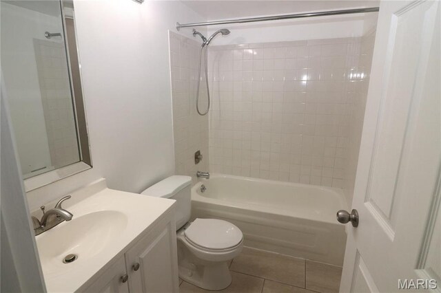 1090 Mersey Bend Dr Unit F, Saint Louis, MO 63129 - bathroom featuring toilet, vanity, tile patterned floors, and bathing tub / shower combination