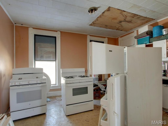 1700 Chestnut, Hannibal, MO 63401 - kitchen featuring white range with gas stovetop