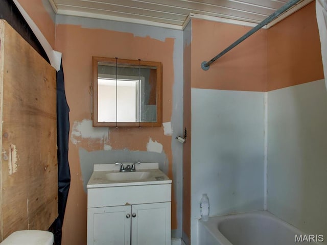 1700 Chestnut, Hannibal, MO 63401 - bathroom featuring vanity, toilet, and shower / washtub combination