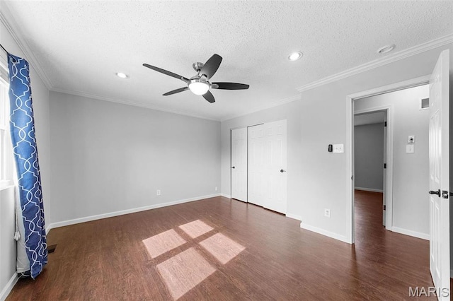 655 Lakewood Dr, Lake St Louis, MO 63367 - unfurnished bedroom featuring wood finished floors, a textured ceiling, recessed lighting, baseboards, and a closet
