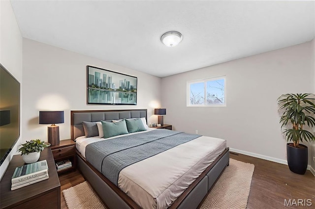 655 Lakewood Dr, Lake St Louis, MO 63367 - bedroom with dark wood finished floors and baseboards