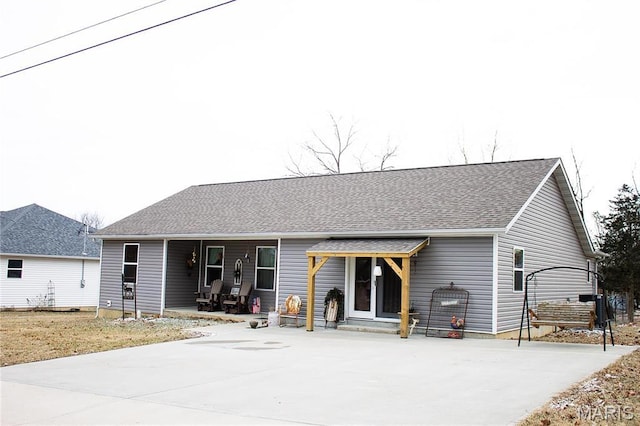 1303 W Coffman St, Salem, MO 65560 - back of house featuring covered porch and a shingled roof