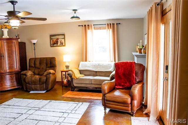 1303 W Coffman St, Salem, MO 65560 - living room with a ceiling fan and wood finished floors