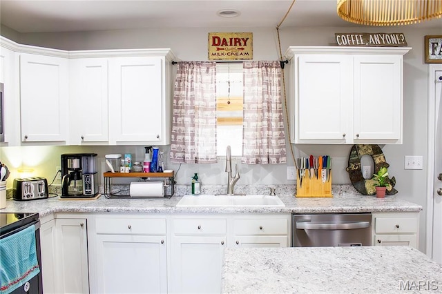 1303 W Coffman St, Salem, MO 65560 - kitchen with dishwasher, a sink, white cabinetry, and range with electric cooktop