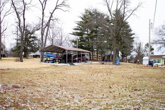1303 W Coffman St, Salem, MO 65560 - view of yard with a carport and a playground