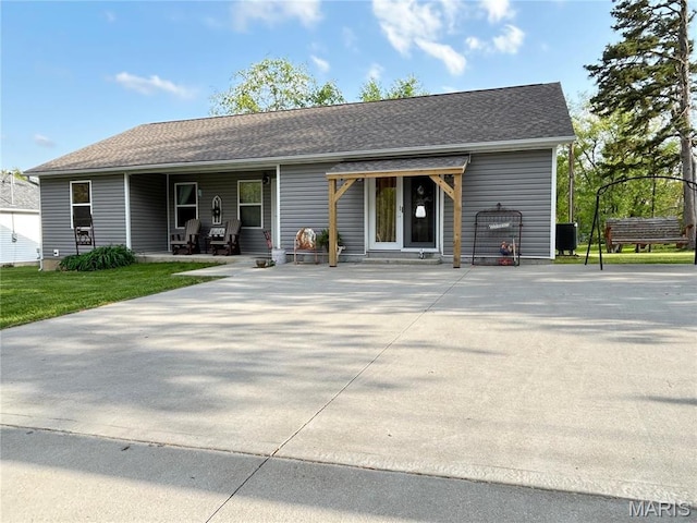 1303 W Coffman St, Salem, MO 65560 - view of front of house with concrete driveway, roof with shingles, and entry steps