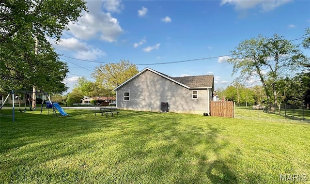 1303 W Coffman St, Salem, MO 65560 - back of house with a playground