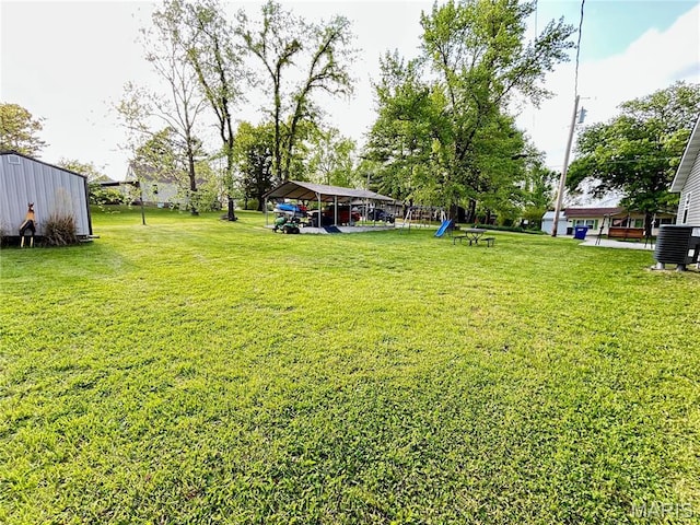 1303 W Coffman St, Salem, MO 65560 - view of grassy yard with a detached carport