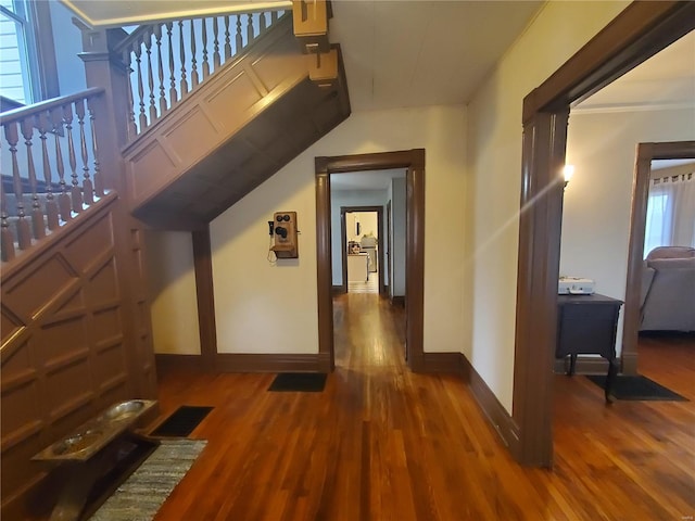 508 S Grand Ave, Houston, MO 65483 - corridor with wood finished floors, baseboards, and stairs