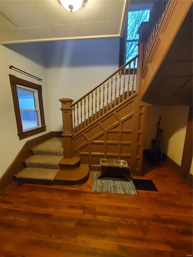 508 S Grand Ave, Houston, MO 65483 - stairs featuring wood finished floors and baseboards