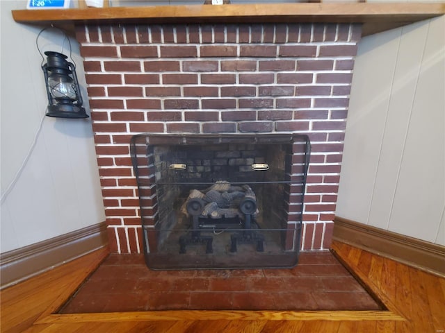 508 S Grand Ave, Houston, MO 65483 - detailed view of a brick fireplace and a decorative wall
