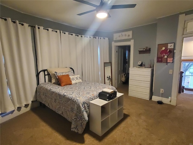 508 S Grand Ave, Houston, MO 65483 - carpeted bedroom with baseboards and ceiling fan