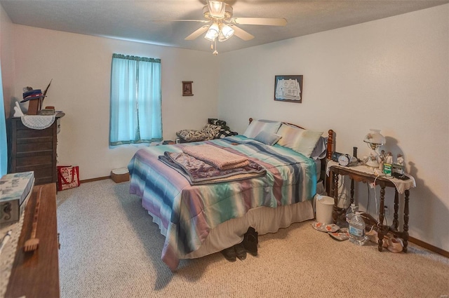 403 S Maple St Unit 403-405, Staunton, IL 62088 - carpeted bedroom featuring baseboards and ceiling fan