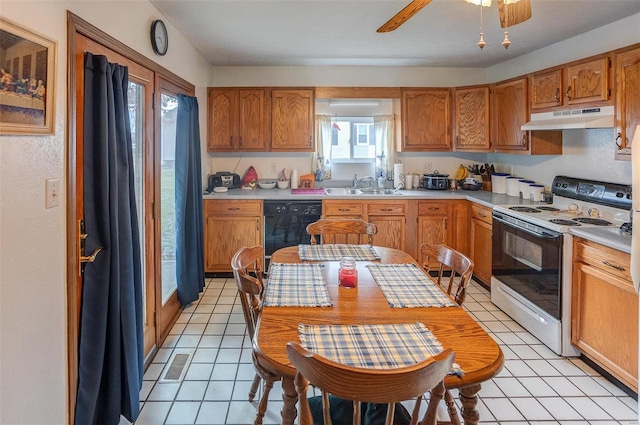 403 S Maple St Unit 403-405, Staunton, IL 62088 - kitchen with white electric range, under cabinet range hood, dishwasher, a sink, and light countertops