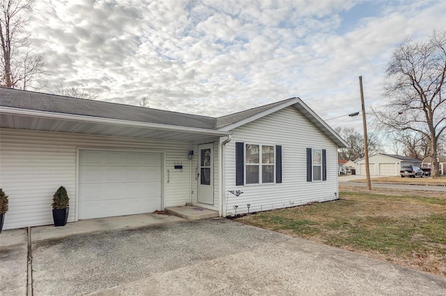 403 S Maple St Unit 403-405, Staunton, IL 62088 - view of front facade with asphalt driveway and a garage