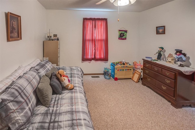 403 S Maple St Unit 403-405, Staunton, IL 62088 - carpeted bedroom with baseboards and a ceiling fan