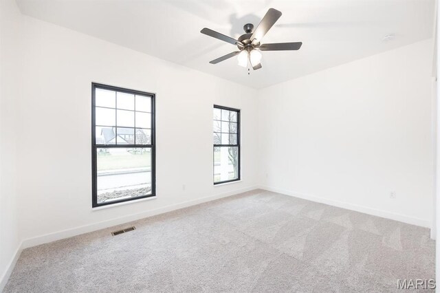 108 Chickasaw Ln, Ofallon, IL 62269 - spare room with carpet floors, baseboards, and a ceiling fan