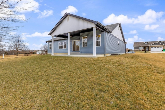 725 Deerfield Ln, Farmington, MO 63640 - back of property with a yard and a patio
