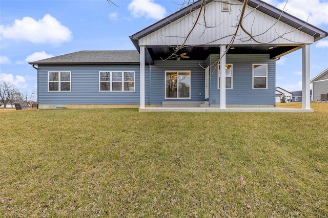 725 Deerfield Ln, Farmington, MO 63640 - back of property with a lawn, a patio, and central AC