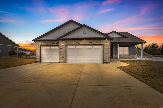 725 Deerfield Ln, Farmington, MO 63640 - view of front of home with concrete driveway, stone siding, and a garage
