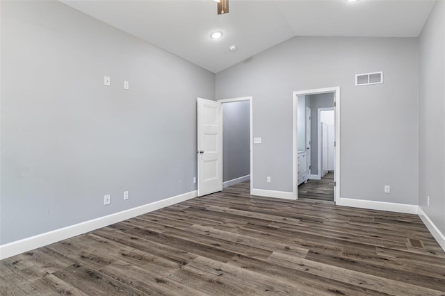 725 Deerfield Ln, Farmington, MO 63640 - unfurnished bedroom with high vaulted ceiling, baseboards, and dark wood finished floors