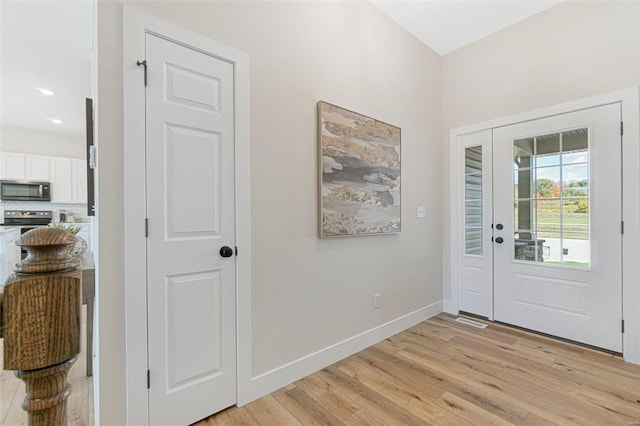 128 Valley Brooke Ct Unit 3Sjm, Washington, MO 63090 - entrance foyer featuring light wood-style flooring, baseboards, and recessed lighting