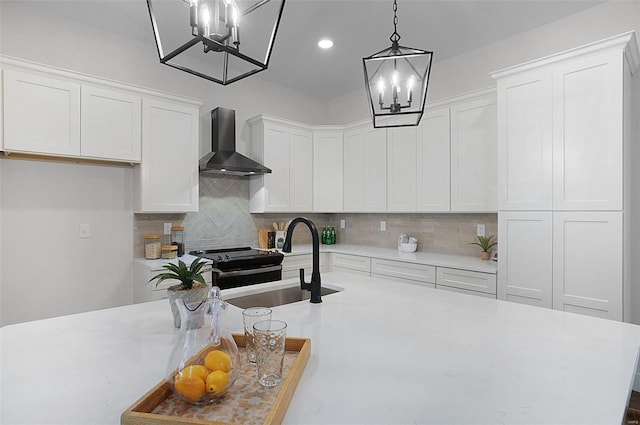 128 Valley Brooke Ct Unit 3Sjm, Washington, MO 63090 - kitchen with a chandelier, wall chimney exhaust hood, tasteful backsplash, and recessed lighting