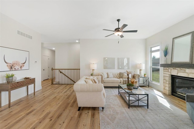 128 Valley Brooke Ct Unit 3Sjm, Washington, MO 63090 - living area with light wood-style flooring, a ceiling fan, a fireplace, and recessed lighting