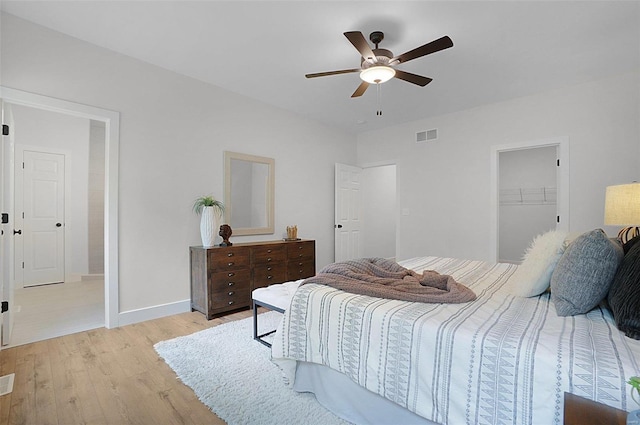 128 Valley Brooke Ct Unit 3Sjm, Washington, MO 63090 - bedroom featuring light wood finished floors, baseboards, and a ceiling fan