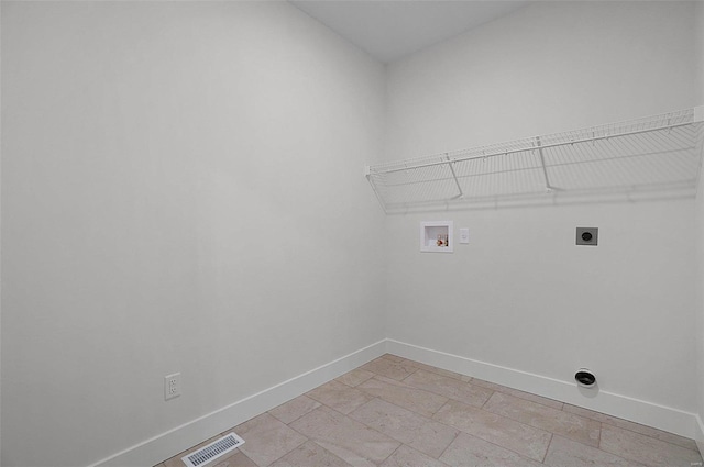 128 Valley Brooke Ct Unit 3Sjm, Washington, MO 63090 - clothes washing area featuring hookup for a washing machine, baseboards, and electric dryer hookup