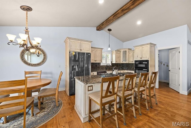 2016 Richview Dr, Saint Jacob, IL 62281 - kitchen featuring fridge with ice dispenser, cream cabinets, tasteful backsplash, a chandelier, and light wood-type flooring