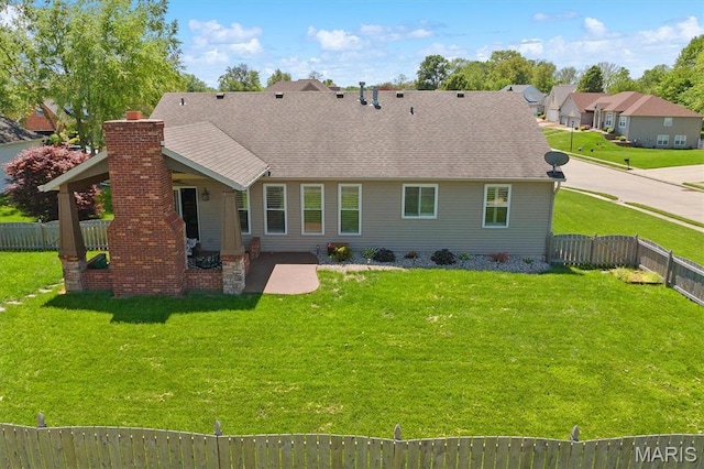 2016 Richview Dr, Saint Jacob, IL 62281 - back of property with a chimney and roof with shingles