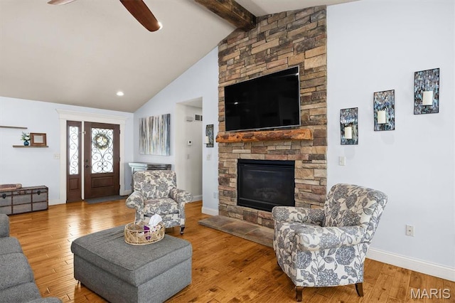 2016 Richview Dr, Saint Jacob, IL 62281 - living area with a stone fireplace, a ceiling fan, wood finished floors, and baseboards