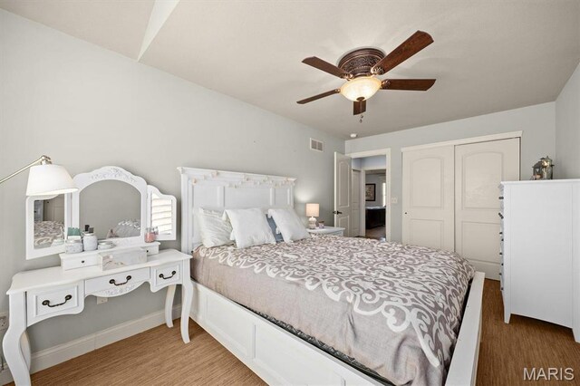 2016 Richview Dr, Saint Jacob, IL 62281 - bedroom with wood finished floors, a closet, a ceiling fan, and baseboards