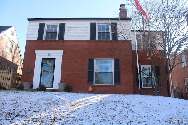7810 Lafon Pl, University City, MO 63130 - view of front of property with a chimney and brick siding