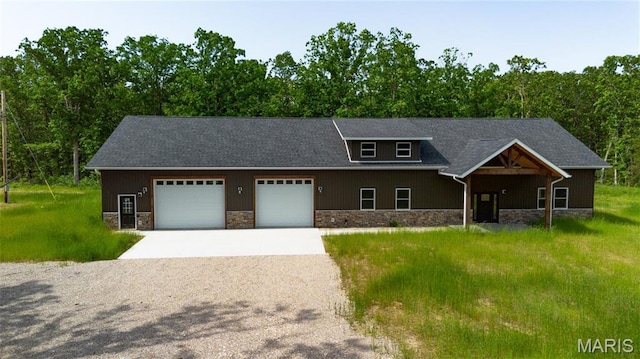20167 County Road 7300, Newburg, MO 65560 - view of front facade with stone siding, driveway, and a garage