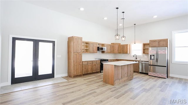 20167 County Road 7300, Newburg, MO 65560 - kitchen featuring open shelves, appliances with stainless steel finishes, a sink, a high ceiling, and french doors