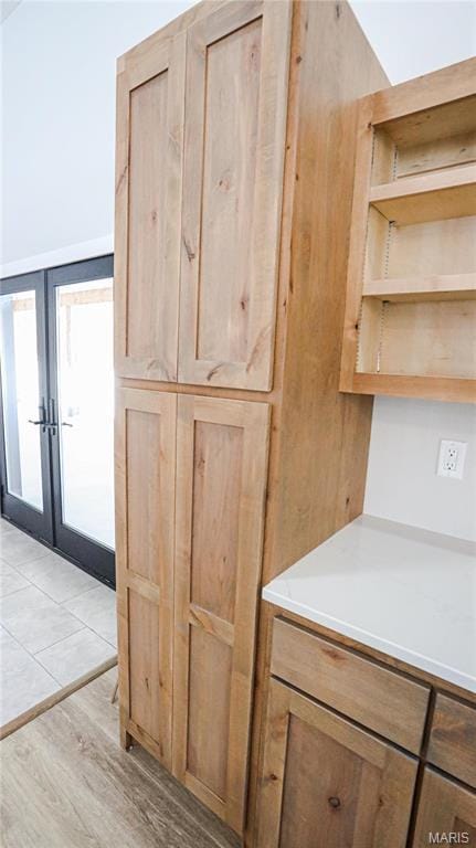 20167 County Road 7300, Newburg, MO 65560 - detailed view of french doors and wood finished floors