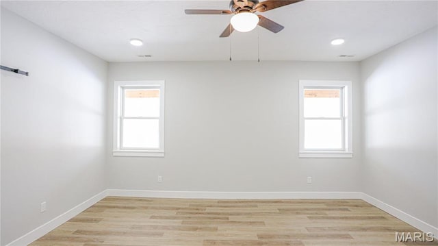 20167 County Road 7300, Newburg, MO 65560 - unfurnished room featuring healthy amount of natural light, ceiling fan, baseboards, light wood-style flooring, and recessed lighting