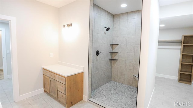 20167 County Road 7300, Newburg, MO 65560 - full bath featuring tiled shower, baseboards, tile patterned flooring, recessed lighting, and a spacious closet