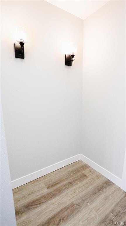 20167 County Road 7300, Newburg, MO 65560 - laundry room with baseboards and wood finished floors