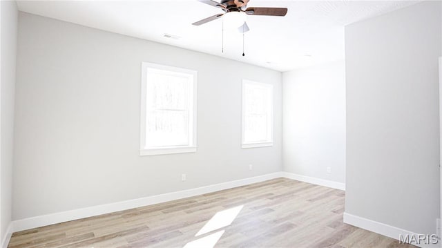 20167 County Road 7300, Newburg, MO 65560 - spare room featuring ceiling fan, light wood-type flooring, and baseboards