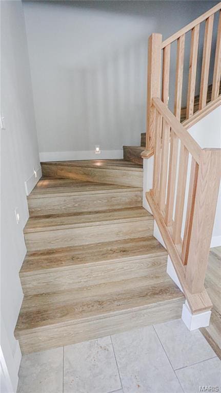 20167 County Road 7300, Newburg, MO 65560 - staircase with baseboards and wood finished floors