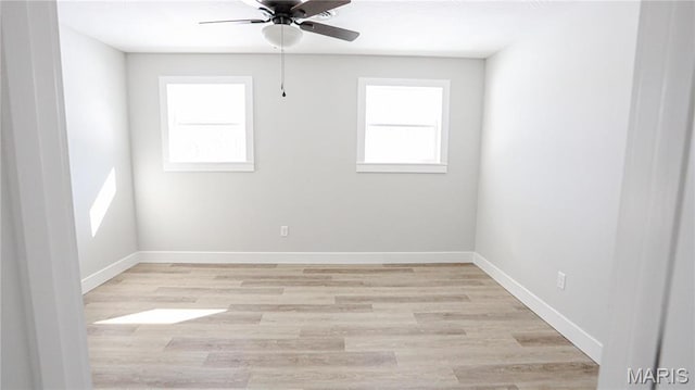 20167 County Road 7300, Newburg, MO 65560 - empty room featuring healthy amount of natural light, ceiling fan, light wood finished floors, and baseboards