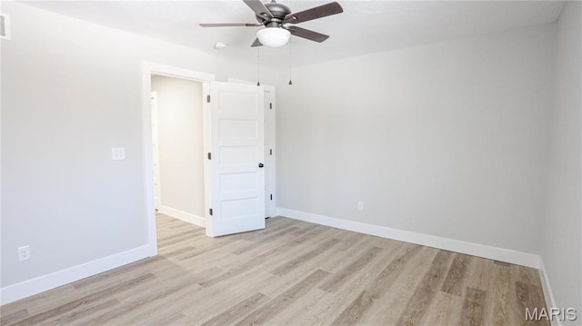 20167 County Road 7300, Newburg, MO 65560 - empty room featuring light wood-style flooring, a ceiling fan, and baseboards