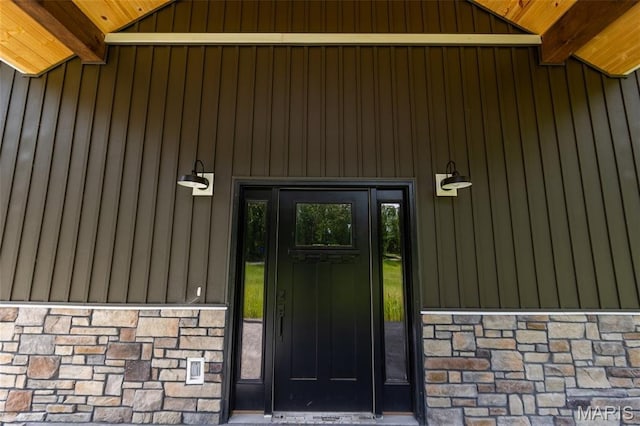 20167 County Road 7300, Newburg, MO 65560 - view of exterior entry featuring stone siding and board and batten siding