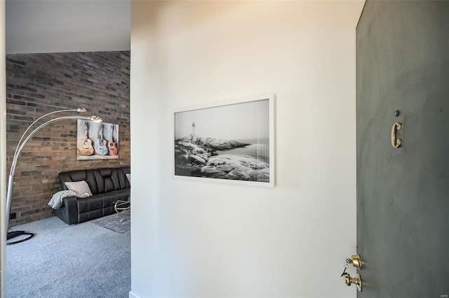 632 Coeur De Royale Dr Unit C, Saint Louis, MO 63141 - hall featuring carpet floors and brick wall
