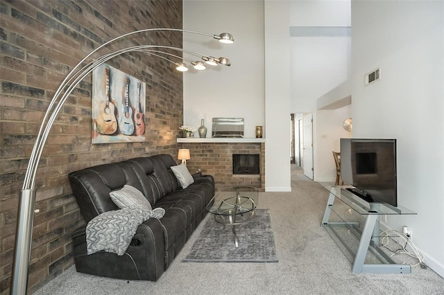 632 Coeur De Royale Dr Unit C, Saint Louis, MO 63141 - living room with carpet floors, a towering ceiling, and baseboards
