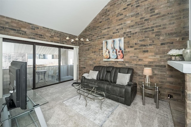 632 Coeur De Royale Dr Unit C, Saint Louis, MO 63141 - carpeted living room with lofted ceiling and brick wall